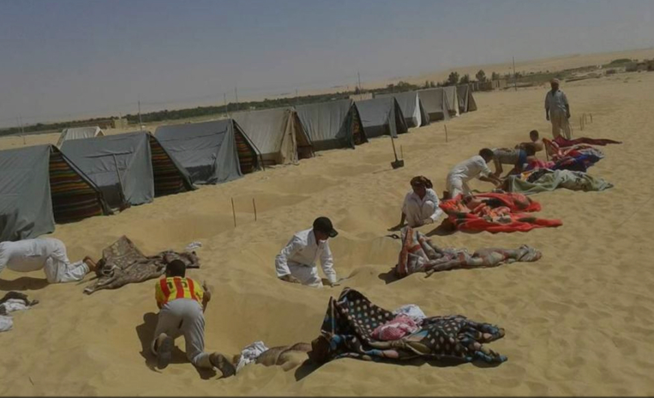 Burying in sand is a cure for rheumatic pain